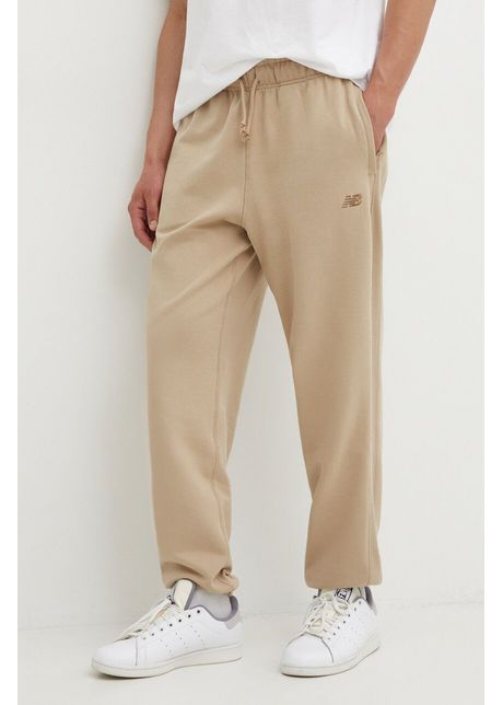 New balance pantaloni de trening din bumbac culoarea bej neted