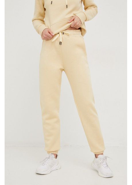 Peak performance pantaloni de trening femei culoarea bej neted